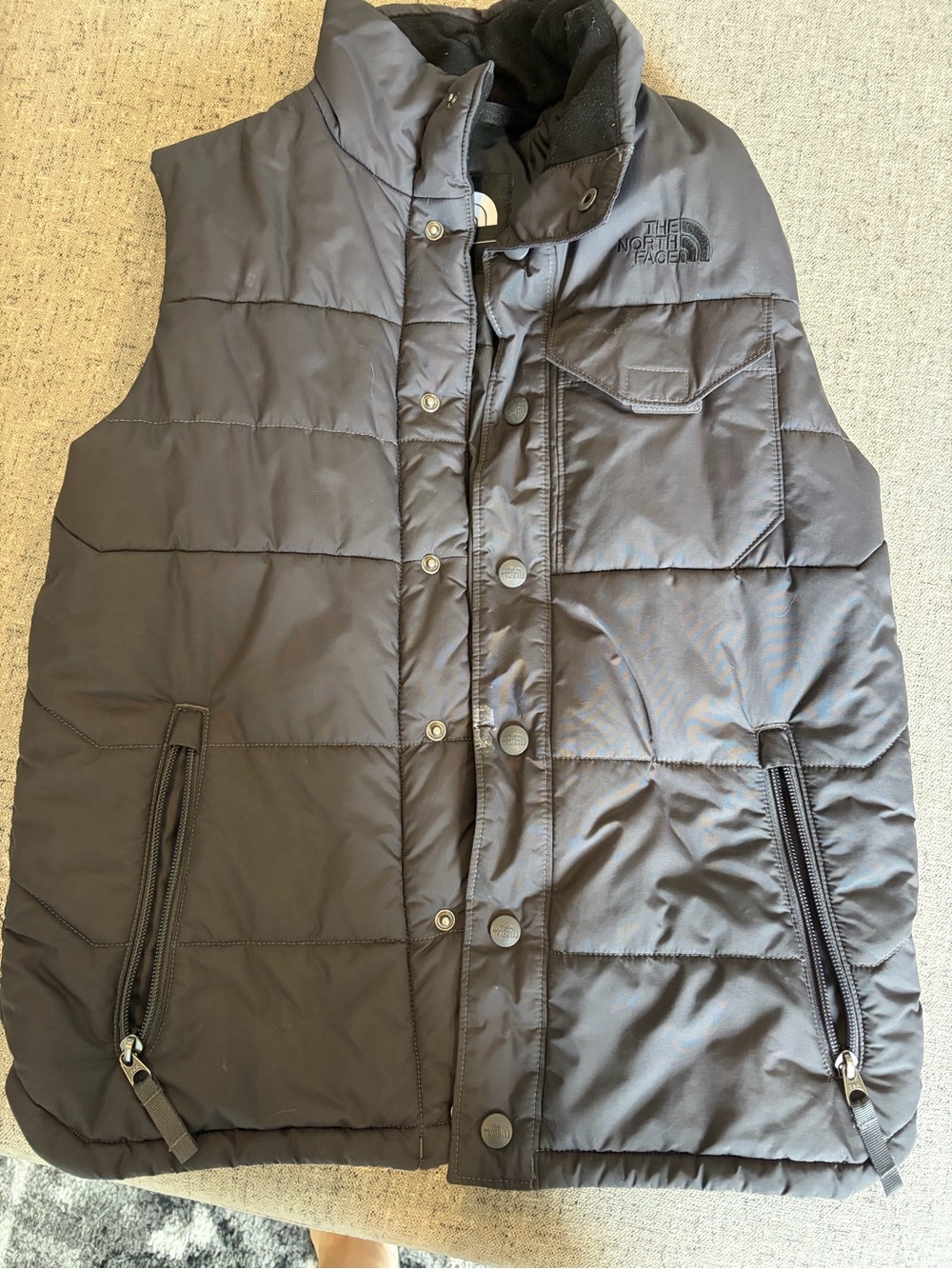 The North Face Men's Black Puffer Vest with Snap Front